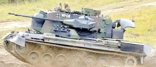 自行高炮价格原因_猎豹式自行高炮技术特点_高炮图片